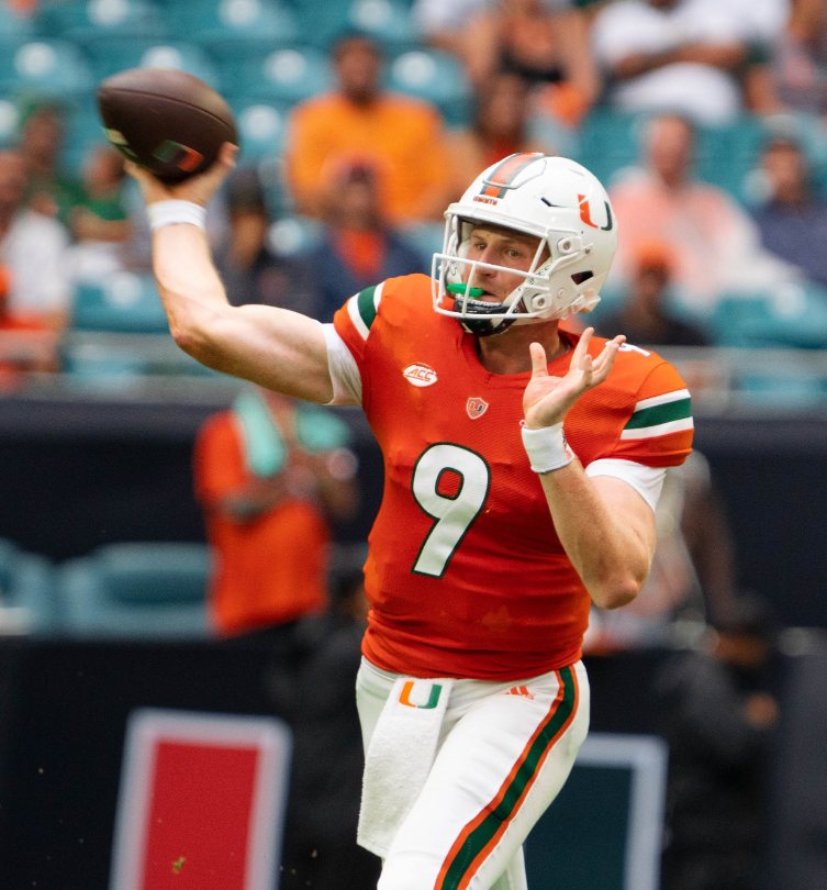 Miami quarterback number 9 releasing a pass