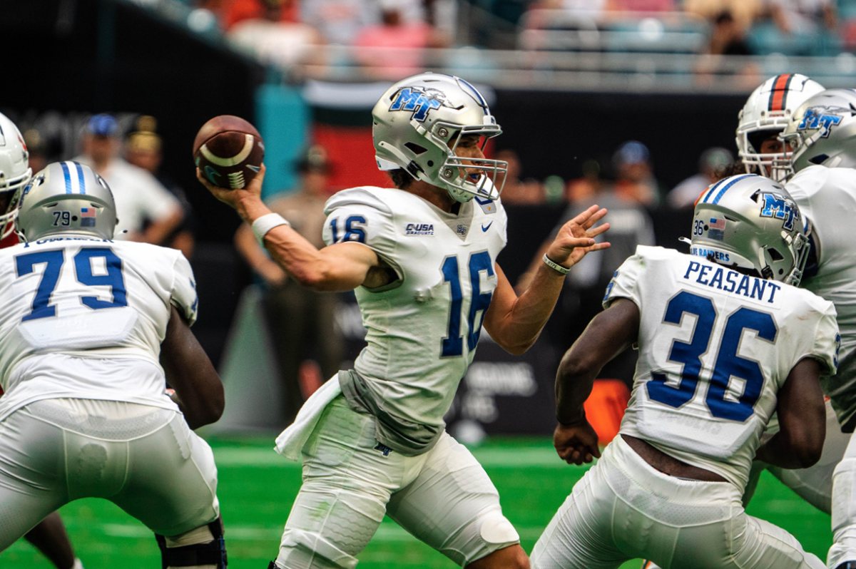 Middle Tennessee quarterback number 16 throwing from the pocket