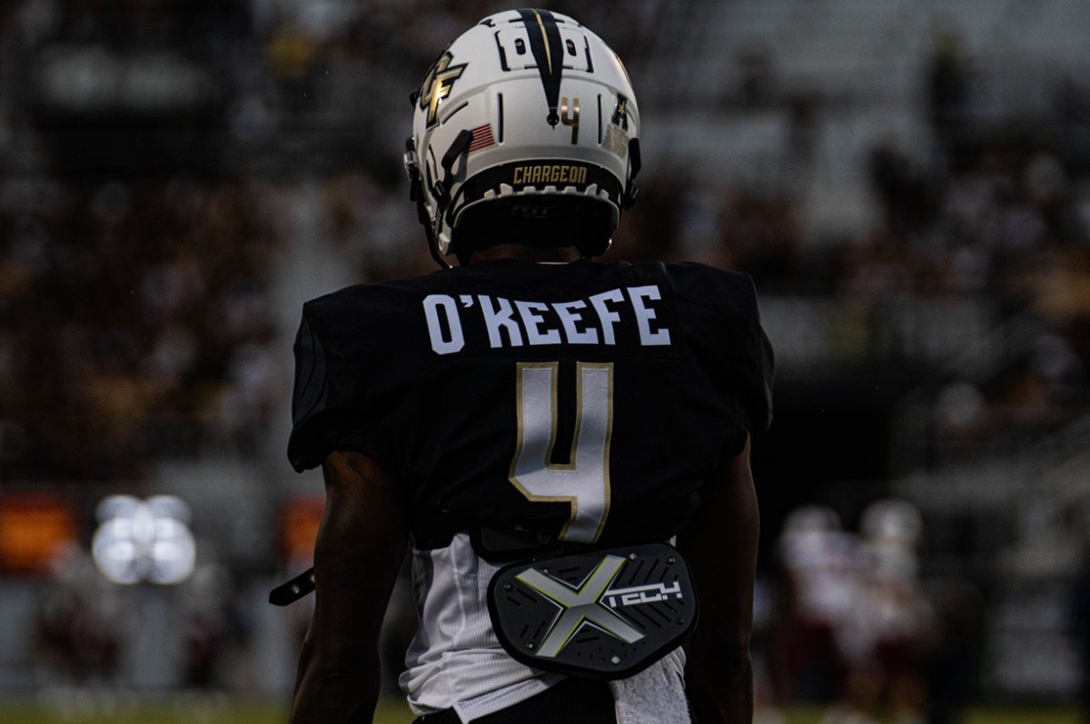 UCF receiver O'Keefe from behind, helmet on, before the snap